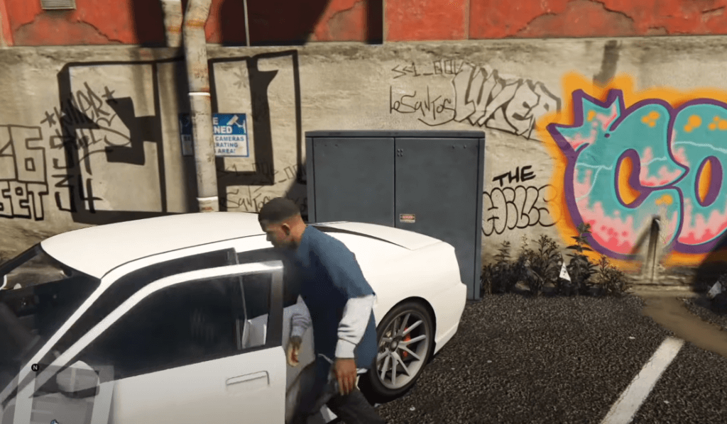 Grand Theft Auto 5 gameplay with graffiti wall